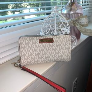 Authentic MK wallet wrist slit